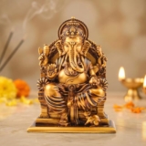 The Divine Tales Serene Blessings Lalitasana Ganesh Idol Antique Gold Finish Resin Ganpati Murti for Home Pooja Room Office and Car Dashboard God Idol Vastu Decor Spiritual Gift 2.5 Inch